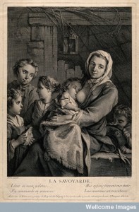 V0015029 A poor woman in a dingy attic, surrounded by her children, o